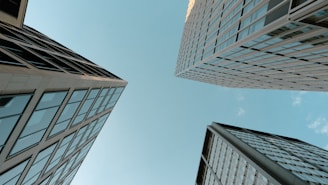 Looking up at tall buildings in a city