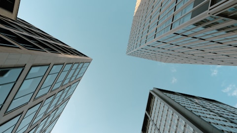 Looking up at tall buildings in a city