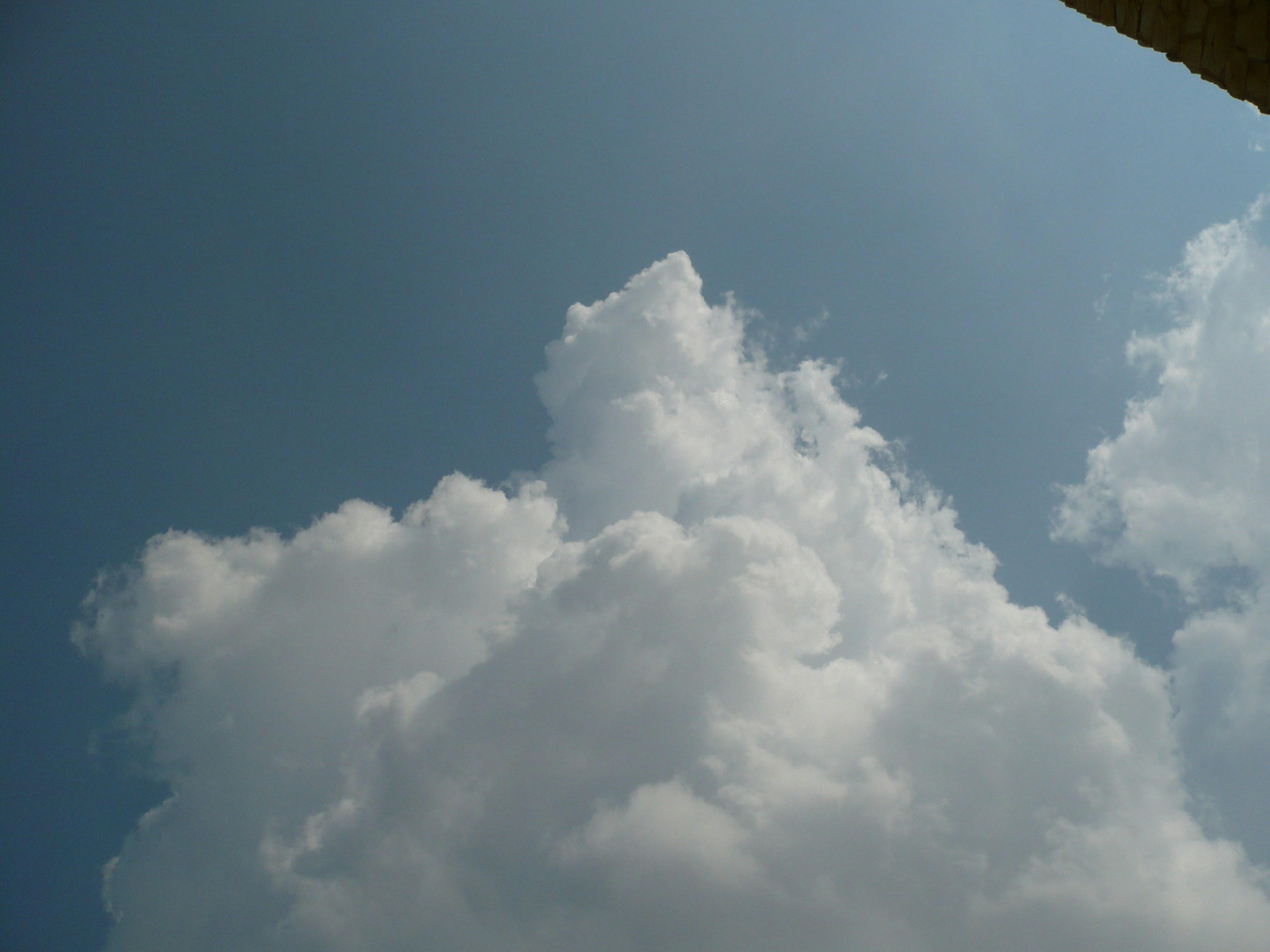 A building with a clock on the side of it