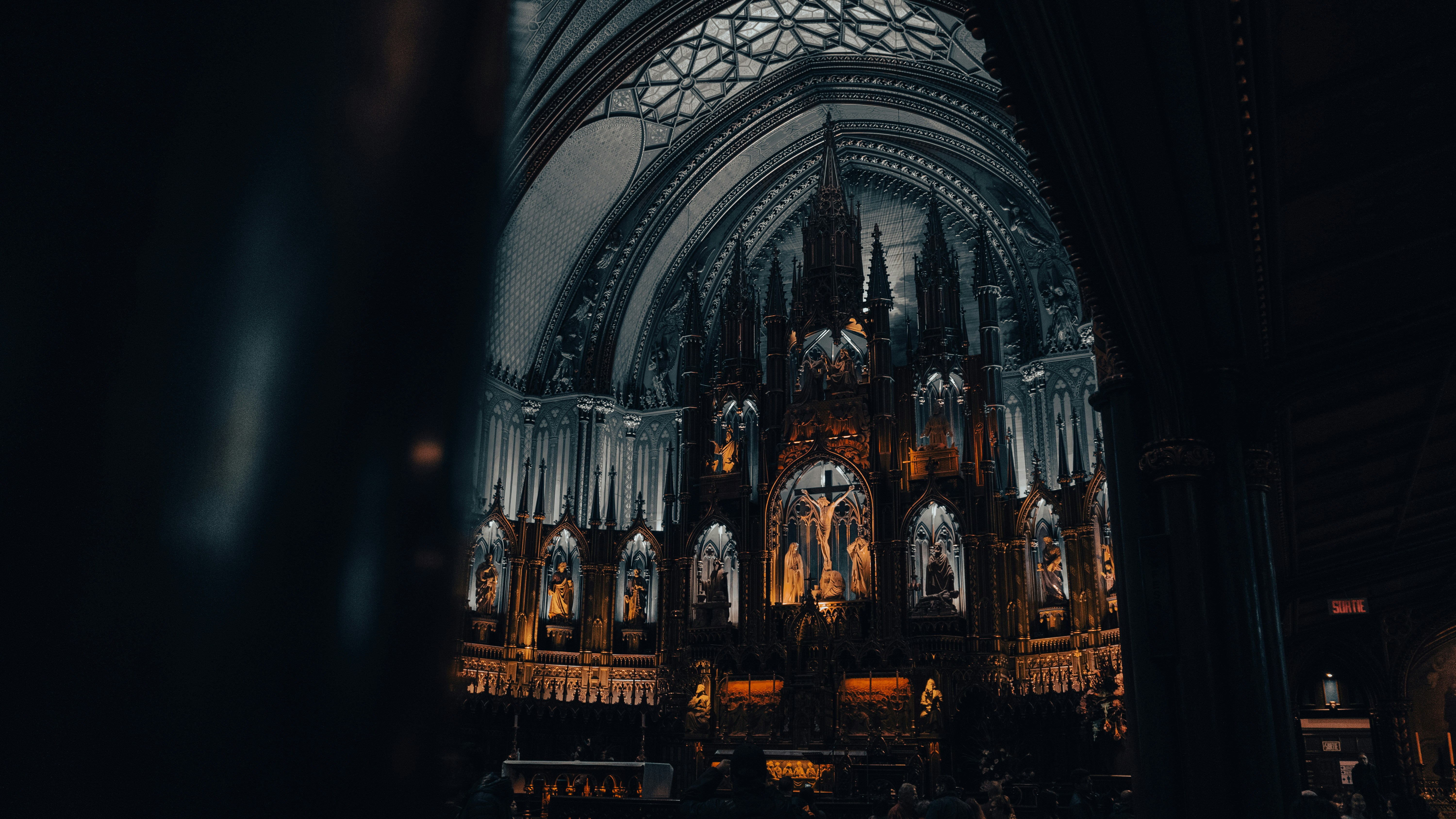 A large cathedral with a clock on the front of it