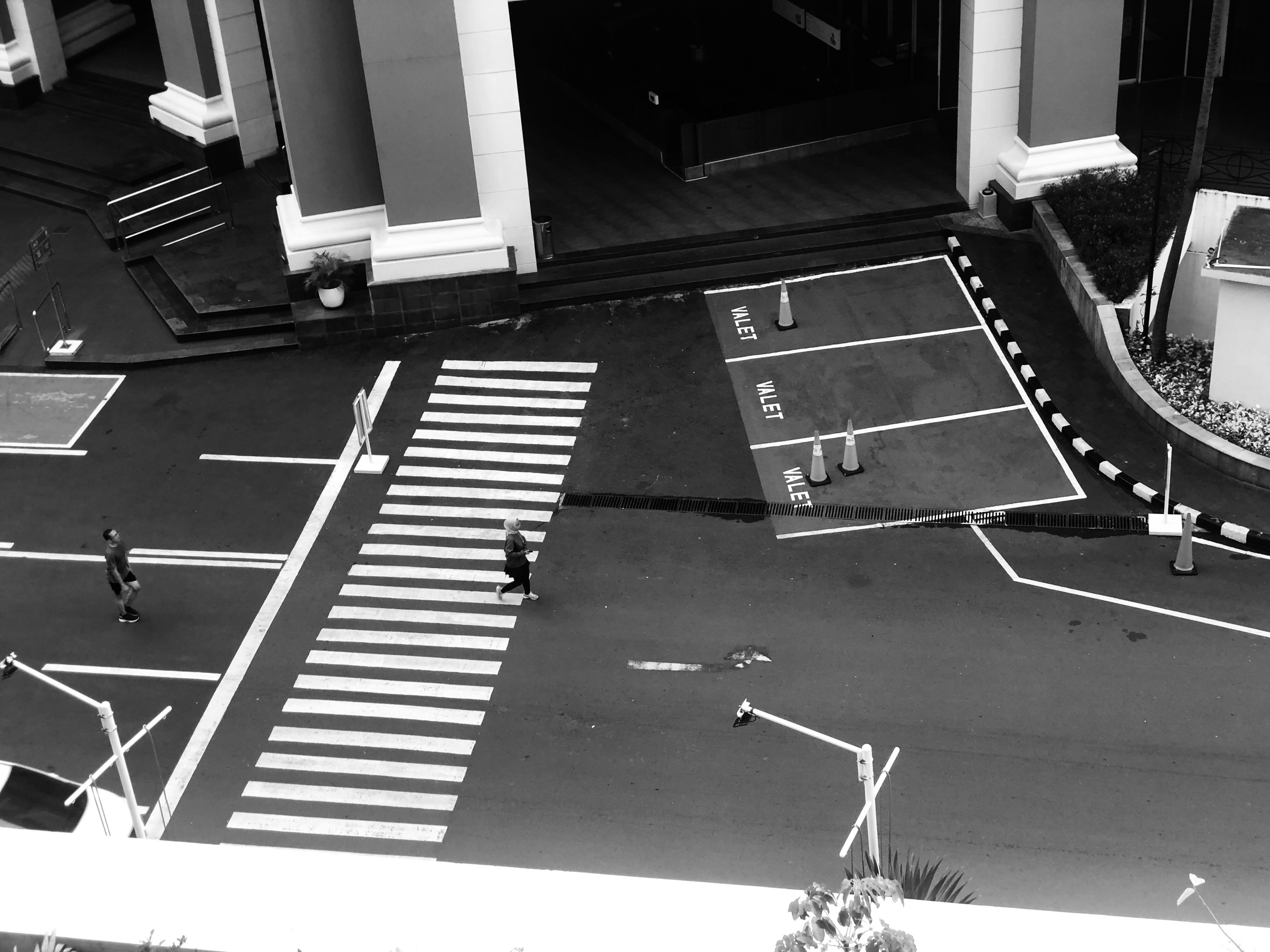 A black and white photo of an intersection