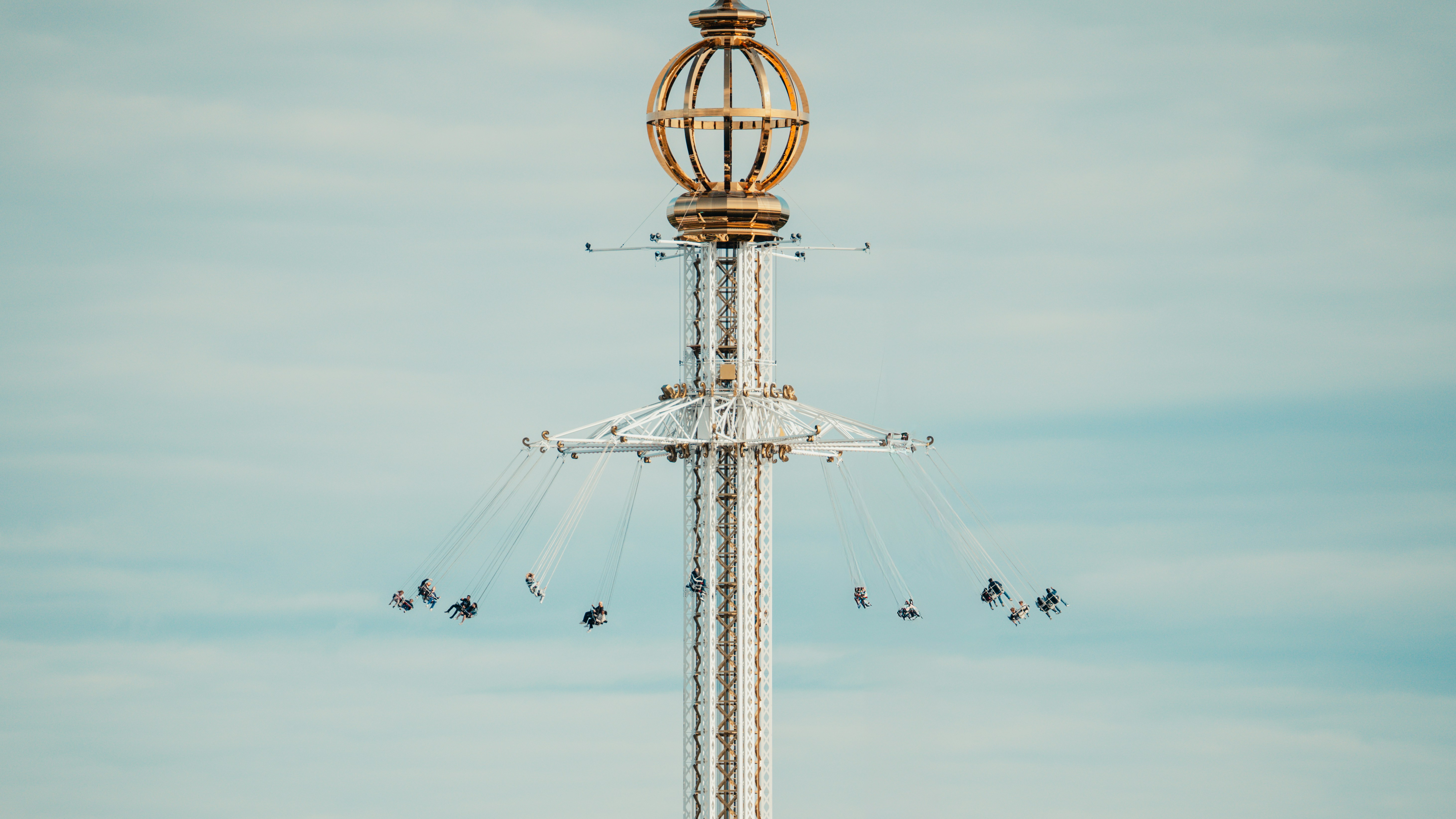 A tall tower with a clock on top of it