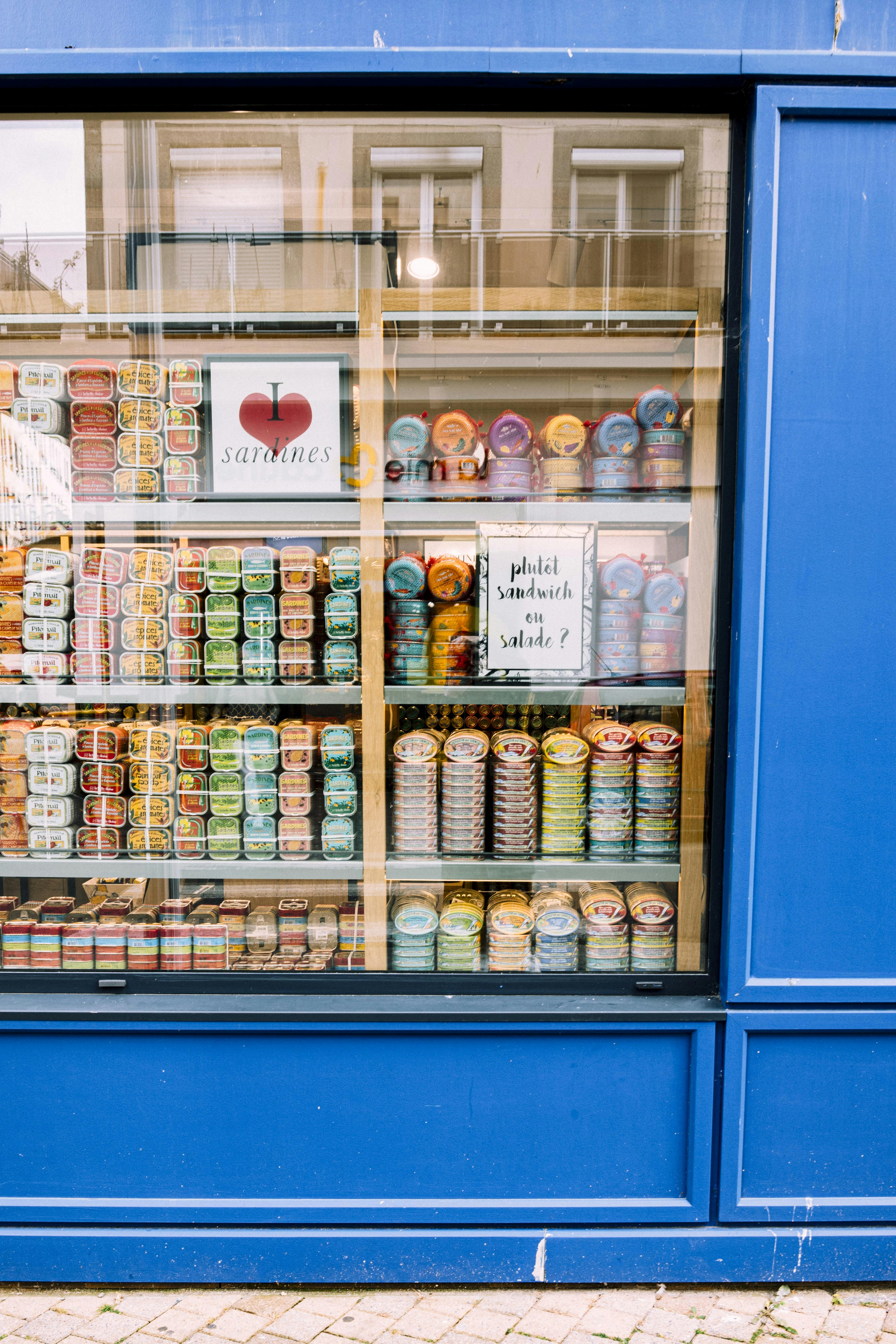 A blue store front with a display of yarn photo – Free Food Image on ...