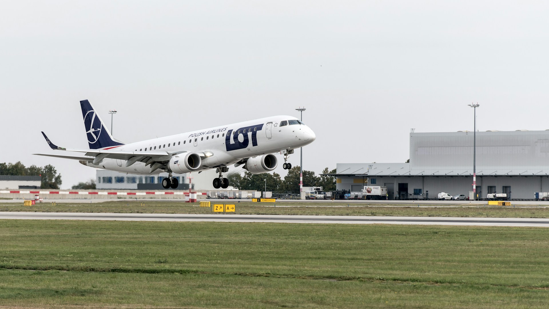 A large jetliner taking off from an airport runway