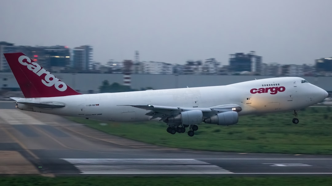A large jetliner taking off from an airport runway, FlyPro Boeing 747-200F