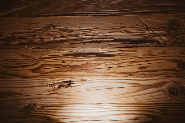 Wooden floor with light shining on it