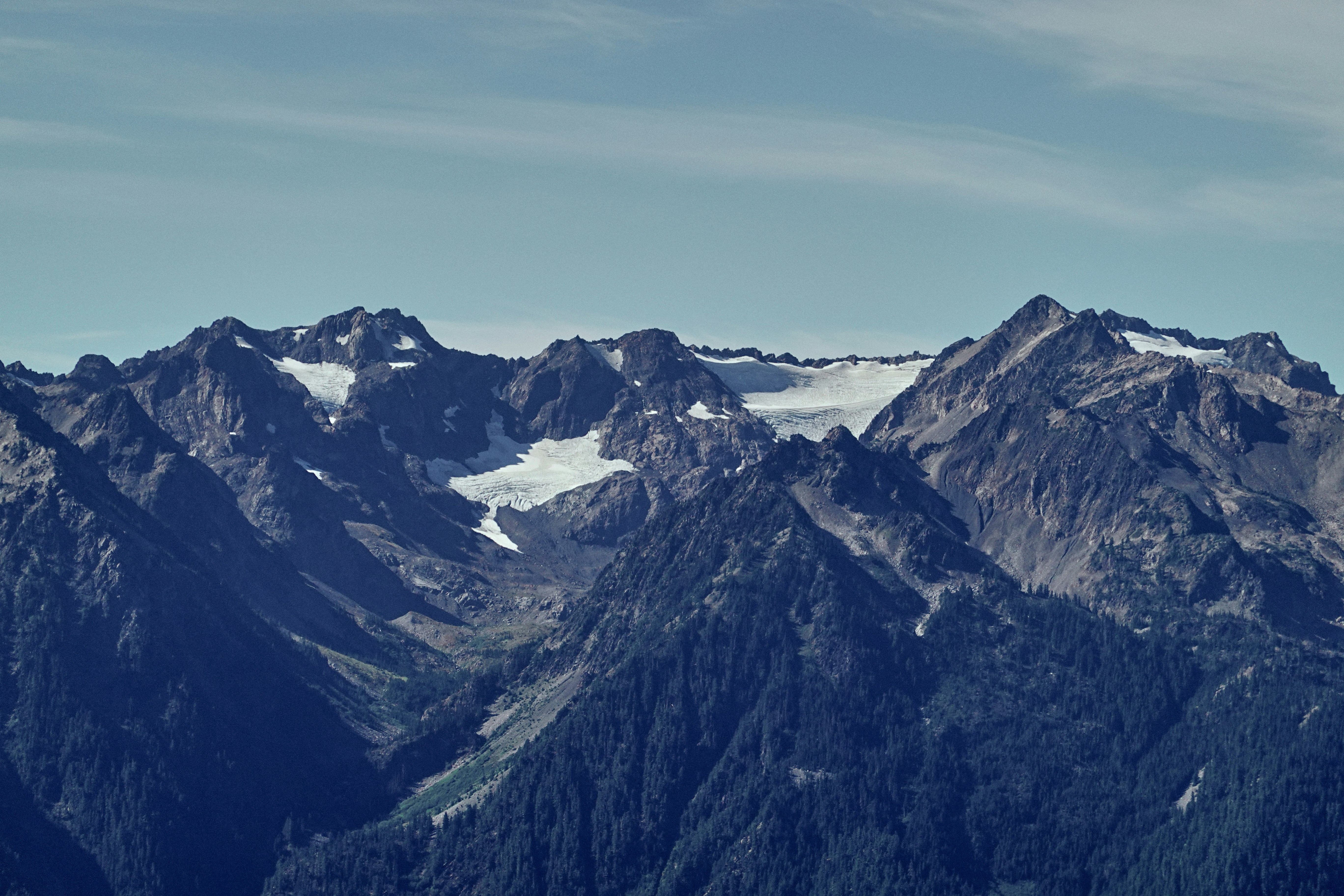 A group of mountains with snow on them
