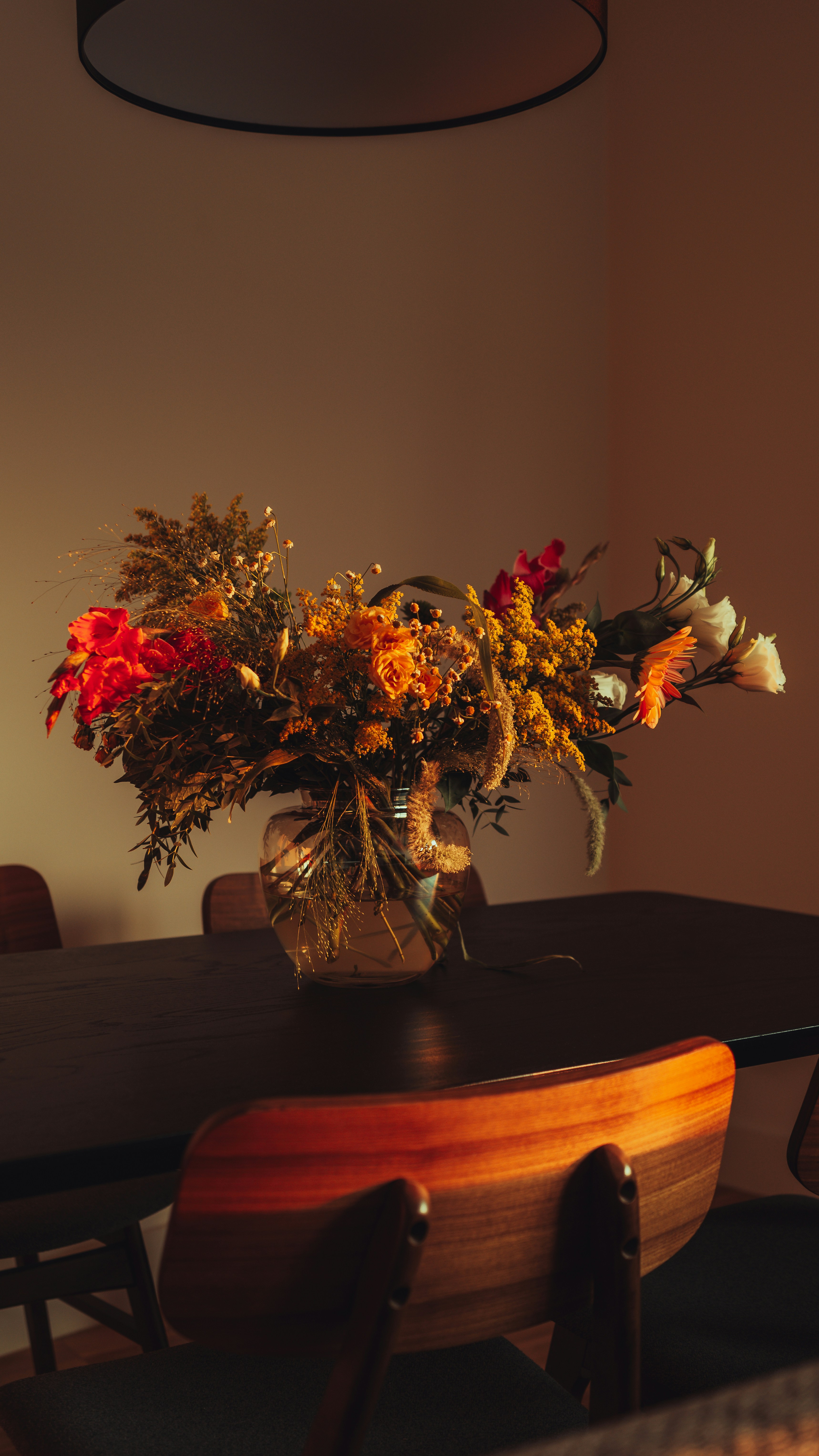 A vase of flowers sitting on top of a table