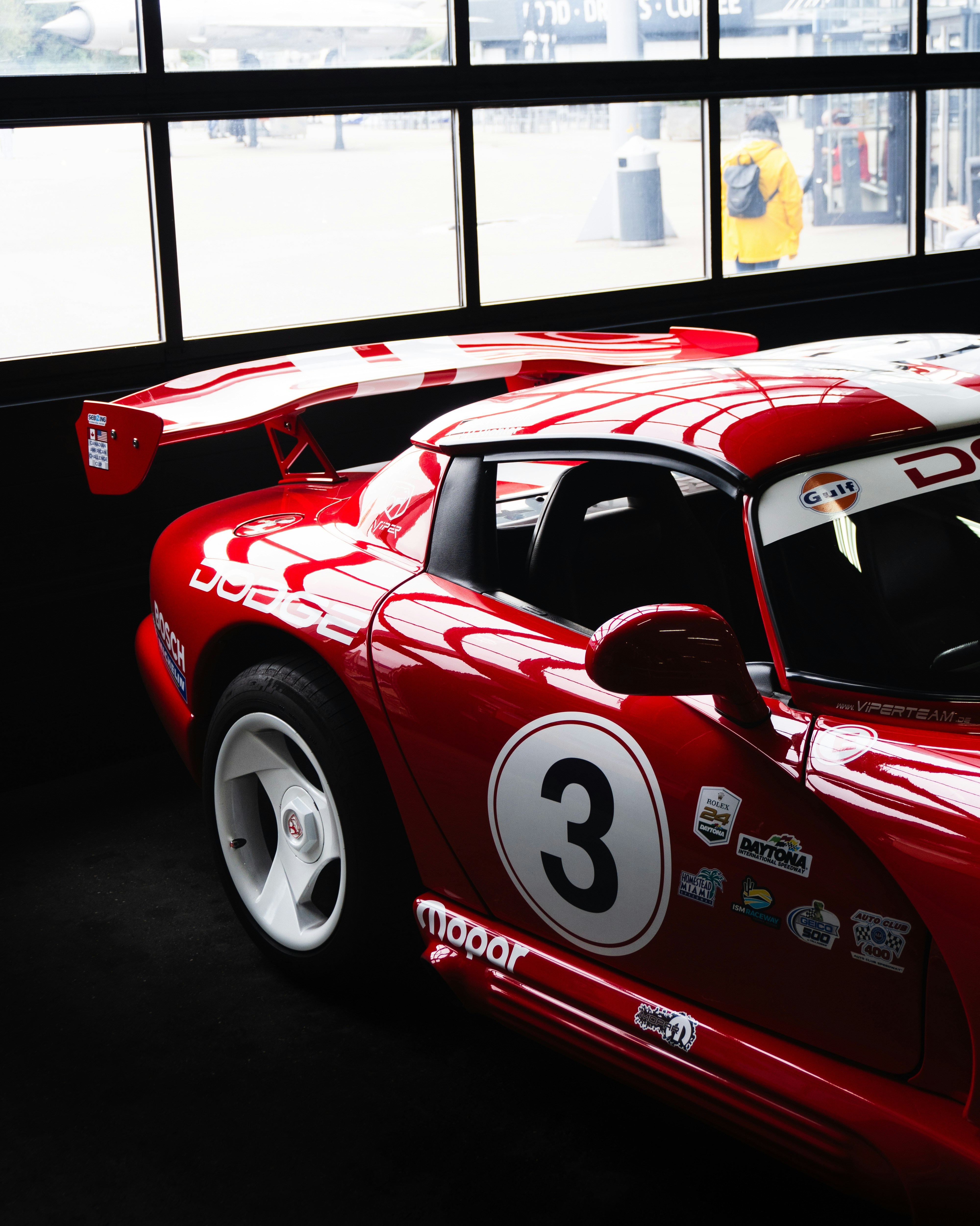 Dodge Viper ACR track, V10 engine supercar, red sports car, racing car wing., ilustrasi artikel Unleash the Venom: Why the Dodge Viper ACR is the Ultimate V10 Icon 7