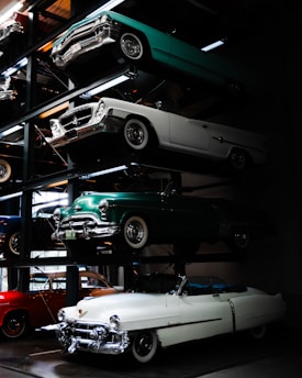 A room filled with lots of different types of cars