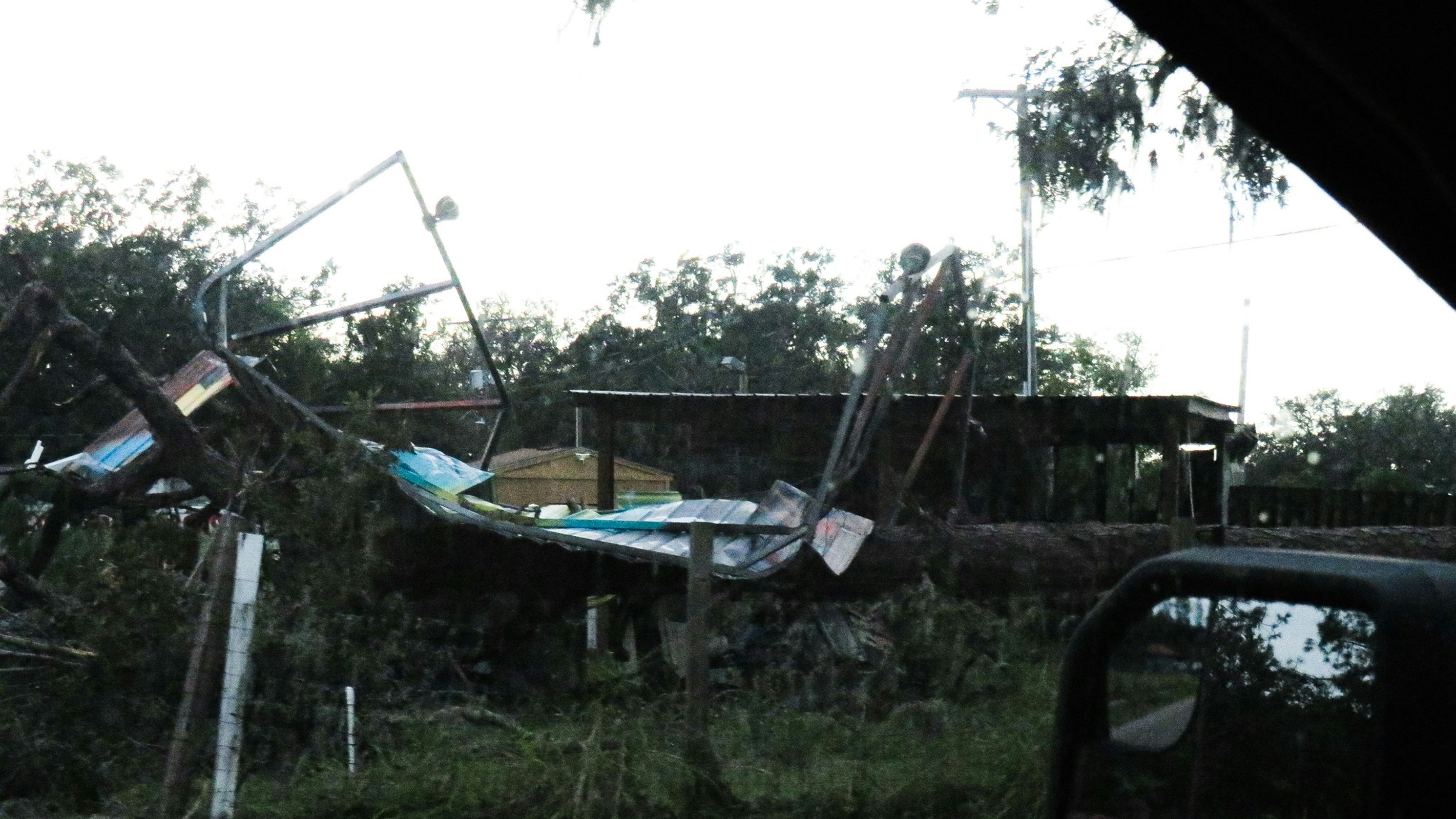 A boat that is sitting in the grass