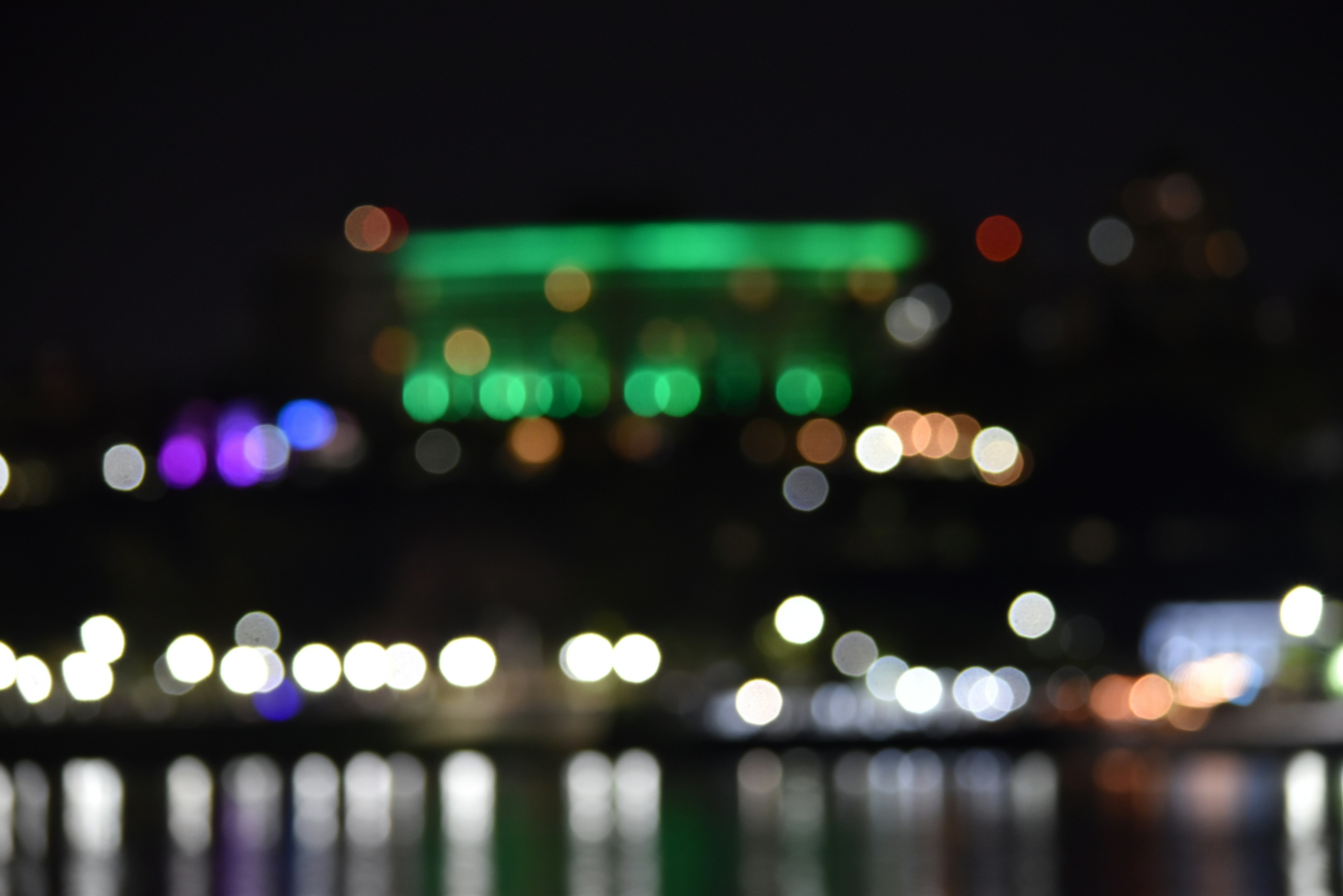 A blurry photo of a city at night