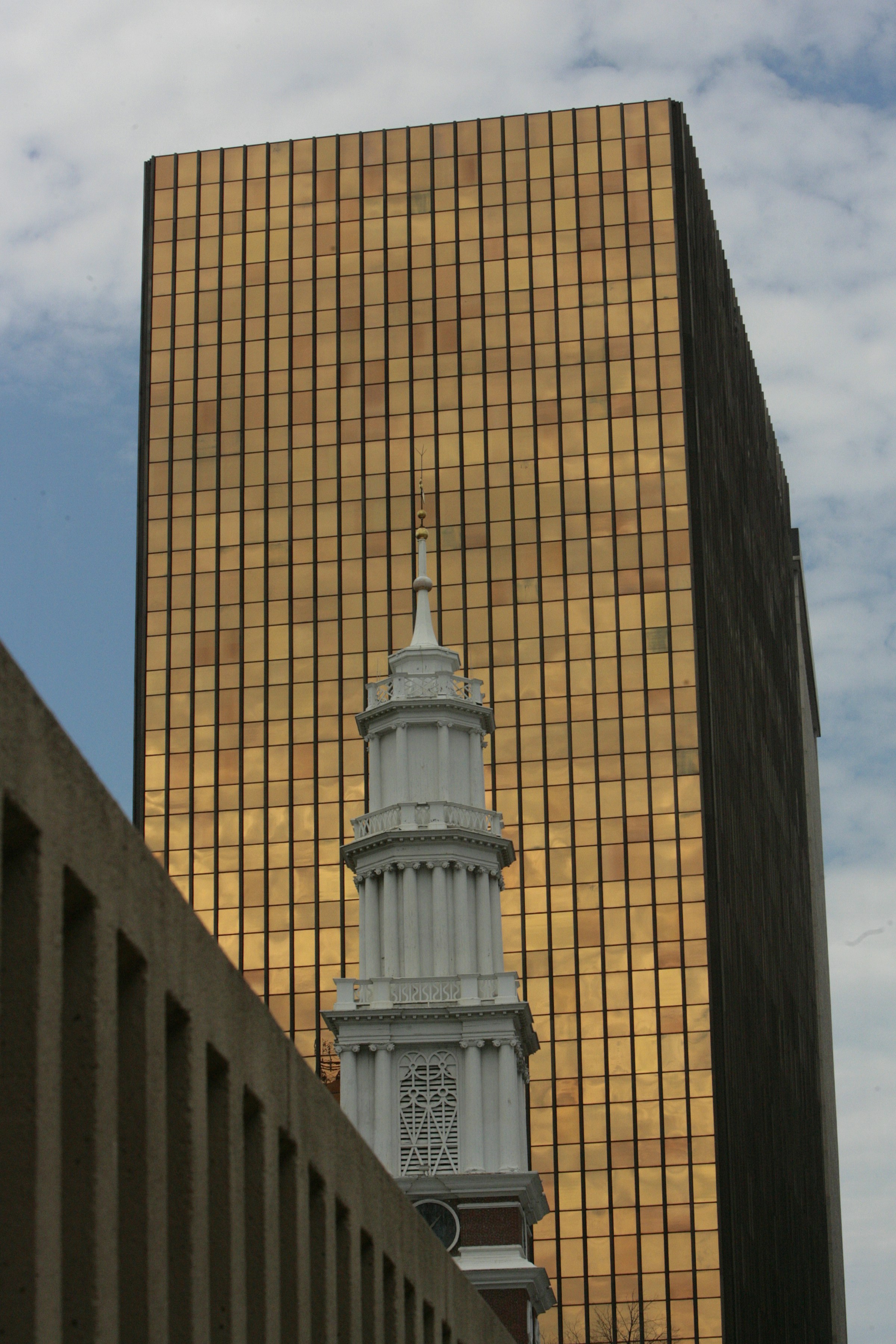 A tall building with a clock on it's side