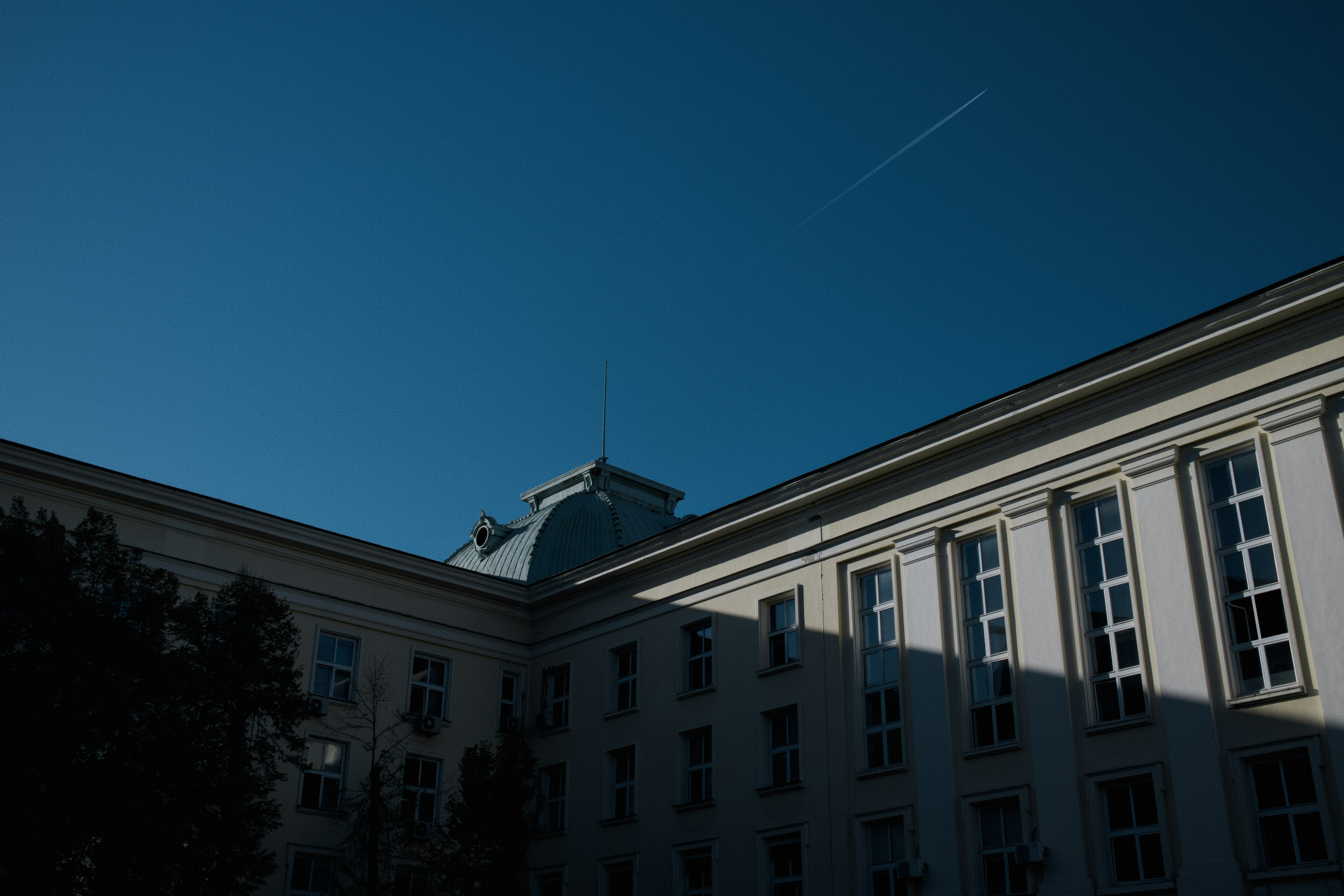 A building with a clock on the top of it