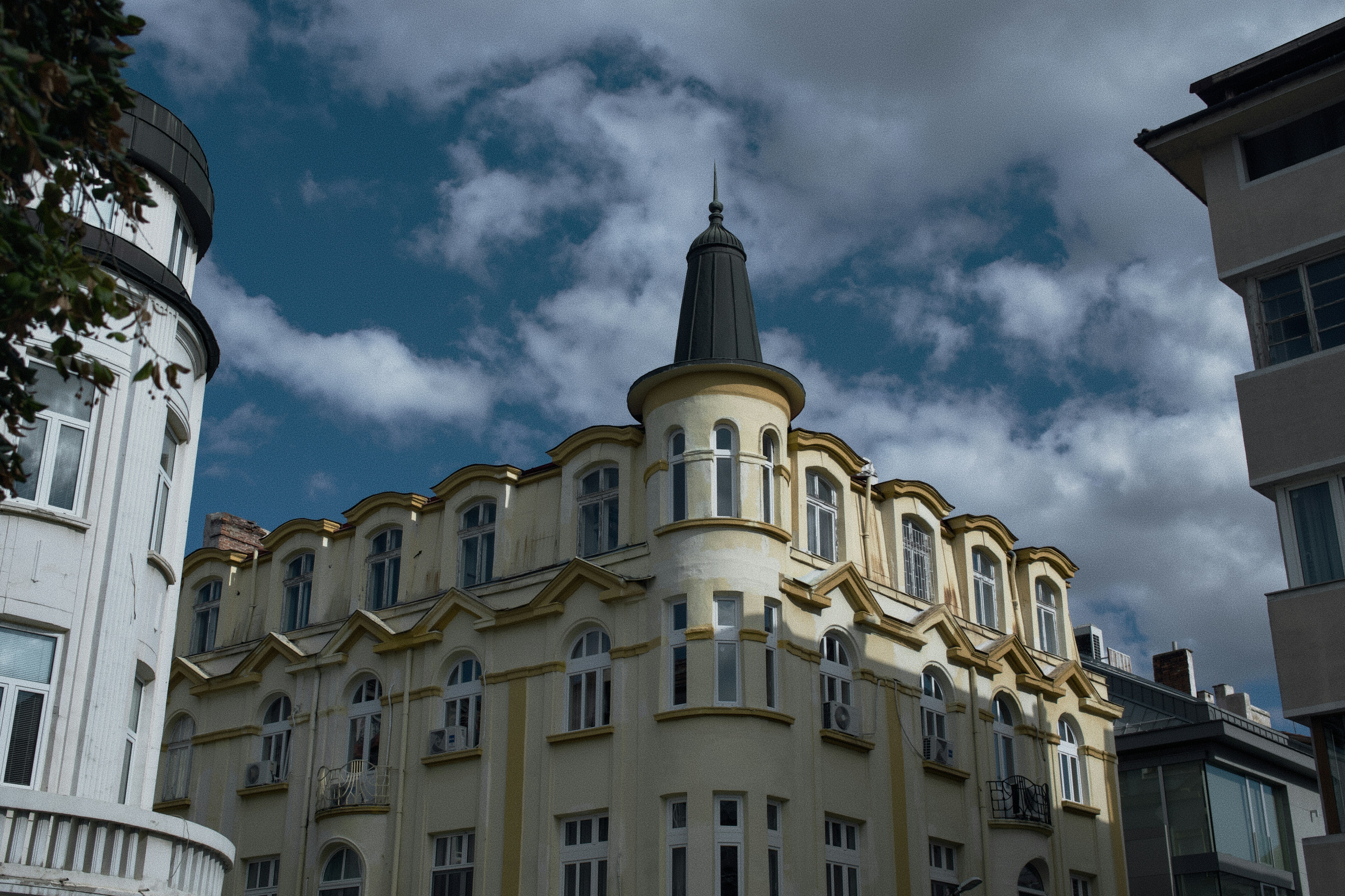 A large building with a clock on the top of it