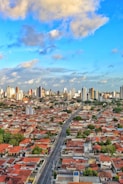 An aerial view of a city with tall buildings