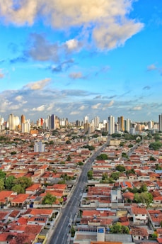 An aerial view of a city with tall buildings