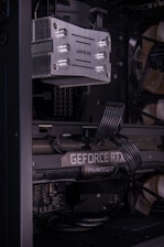 A close up of a computer case with wires