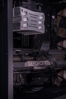 A close up of a computer case with wires