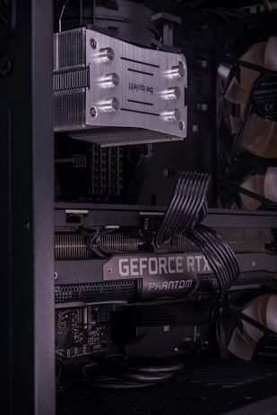 A close up of a computer case with wires