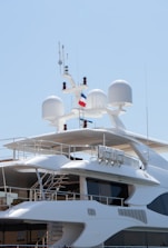A large white boat sitting in the water