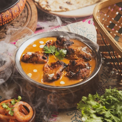 A bowl of food sitting on top of a table