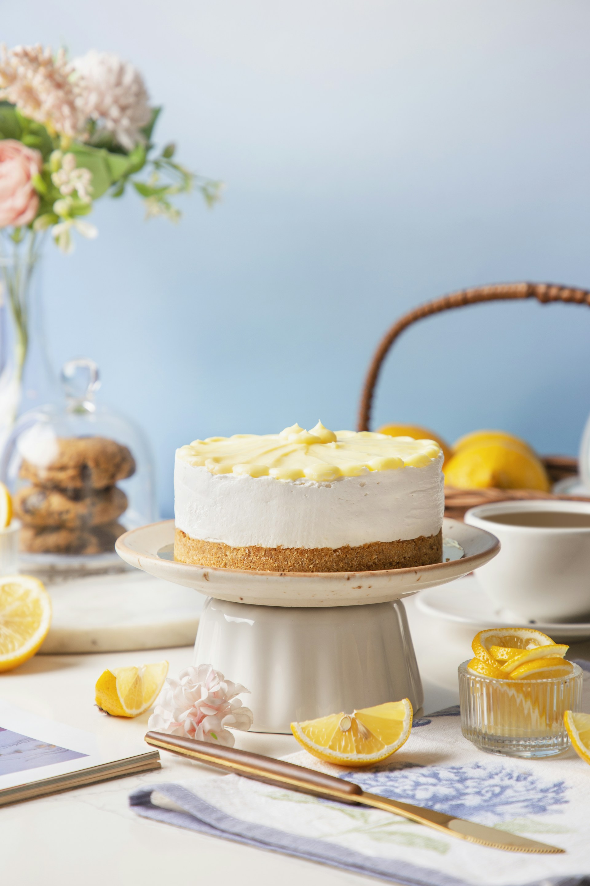 A cake sitting on top of a white cake plate