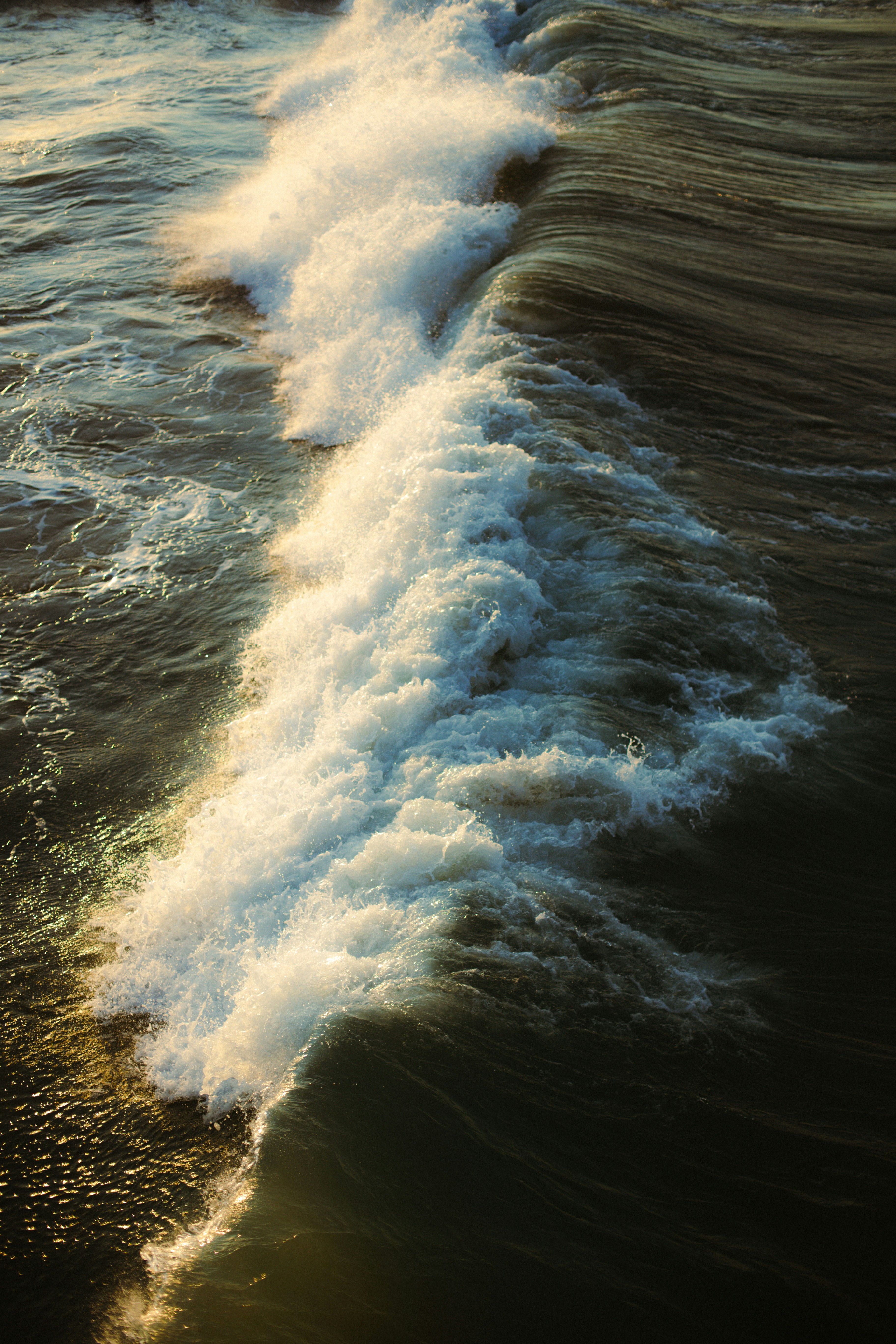 The wake of a boat in the ocean