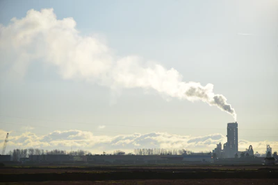 A factory with smoke coming out of it