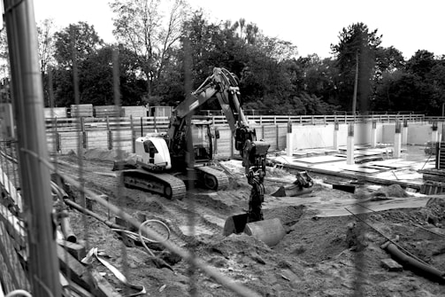 A black and white photo of a construction site