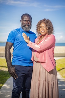 A man and a woman standing next to each other