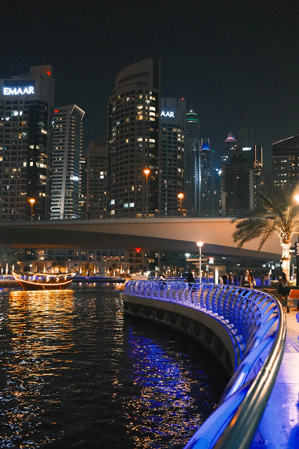 Dubai Marina towers and illuminated waterfront after dark