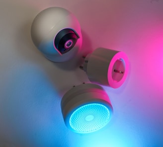 A couple of lights that are on a wall