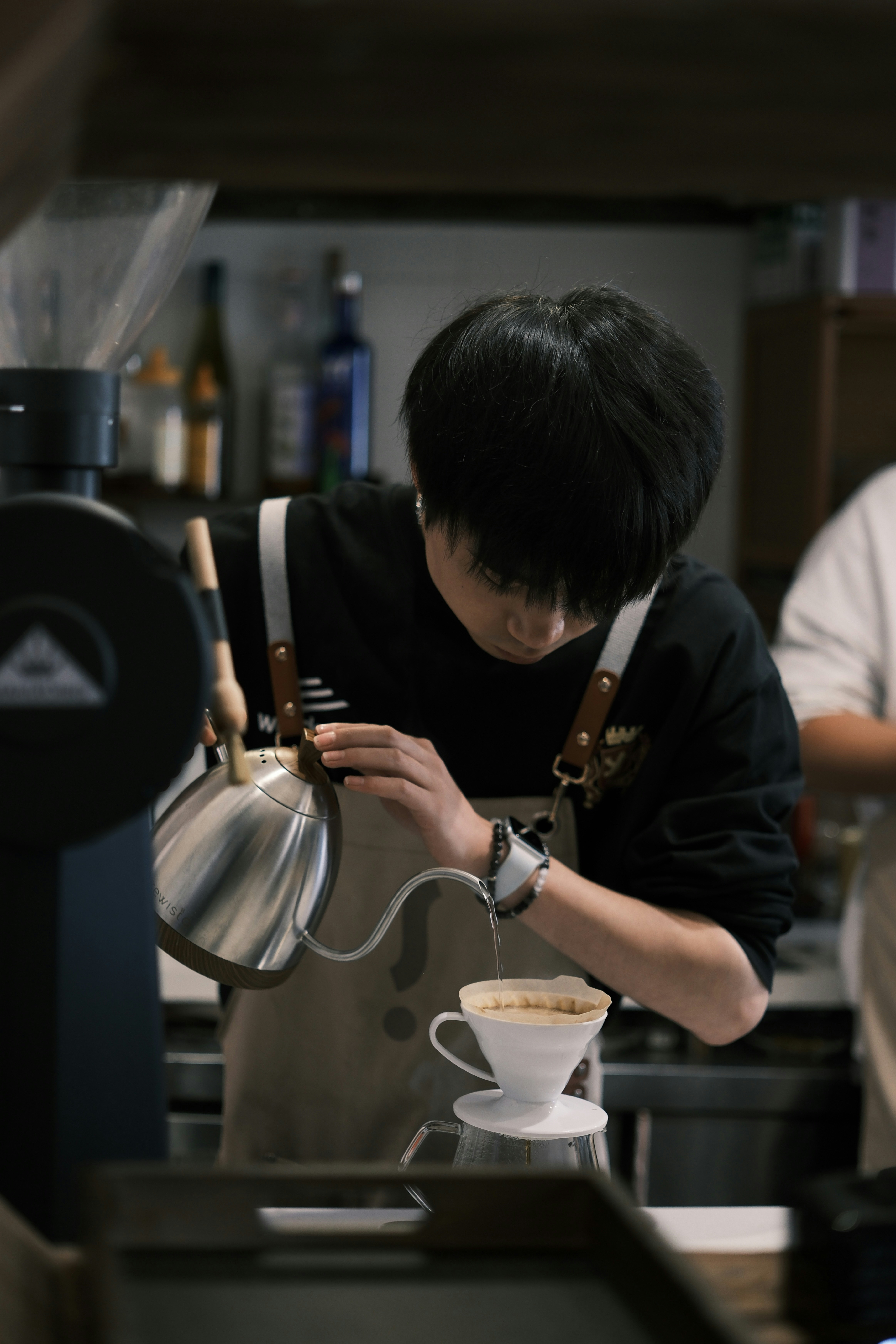 Café interaction with friendly barista