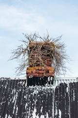 A pile of bricks sitting on top of a metal roof