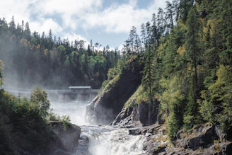 A river with a waterfall in the middle of it