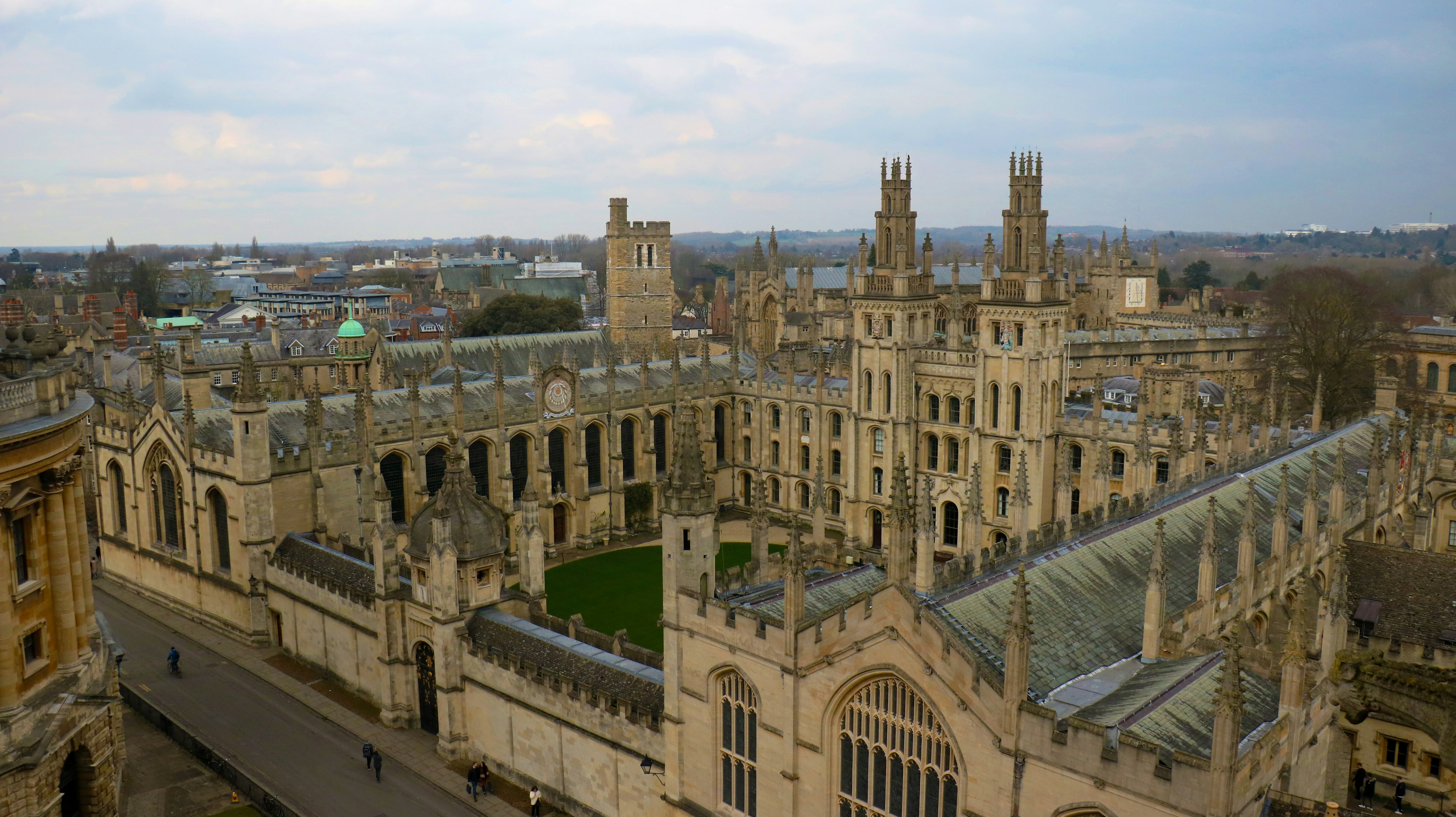 An aerial view of a large building with a clock tower
