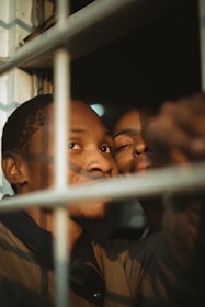 A couple of men standing next to each other