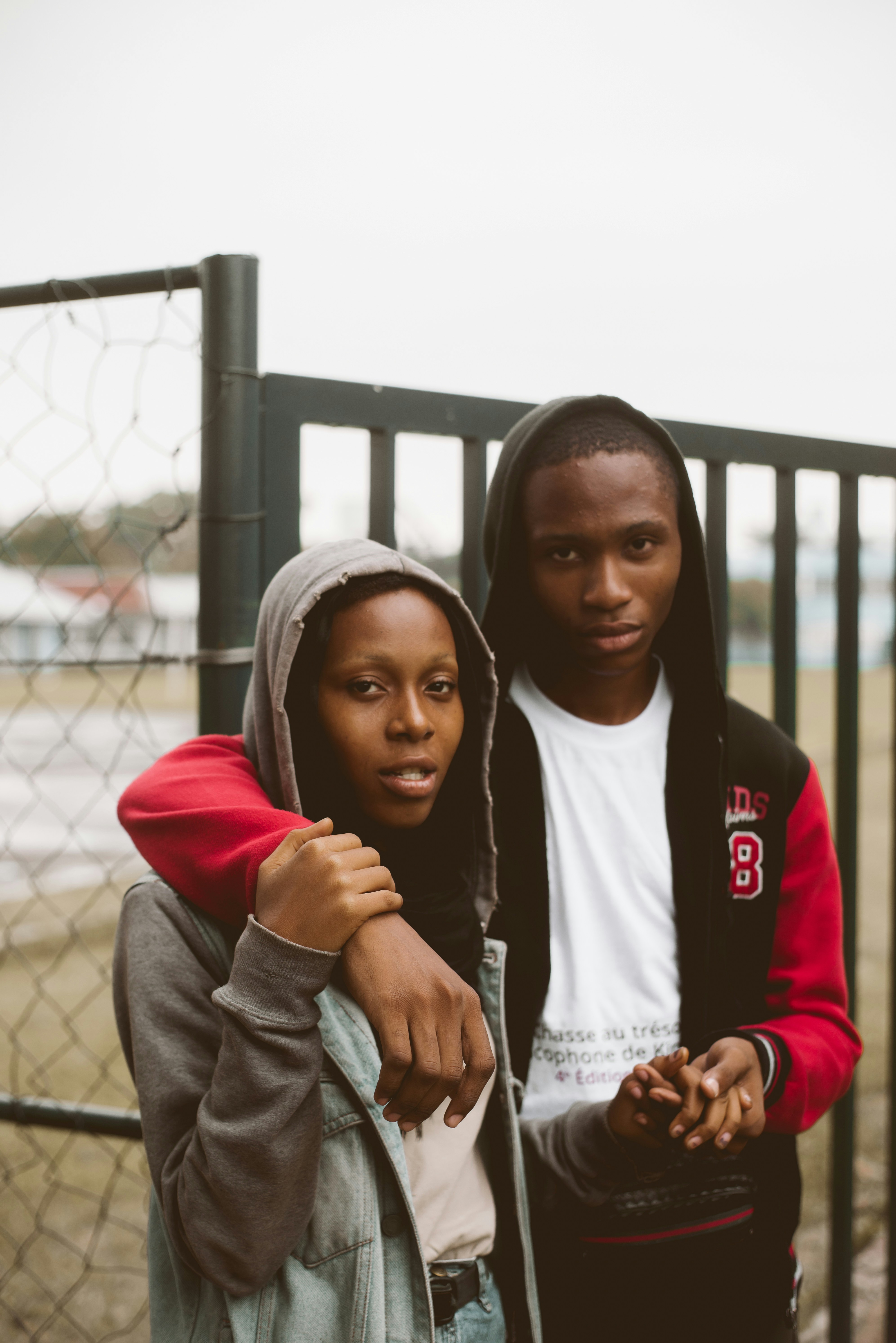 A man and a woman standing next to each other