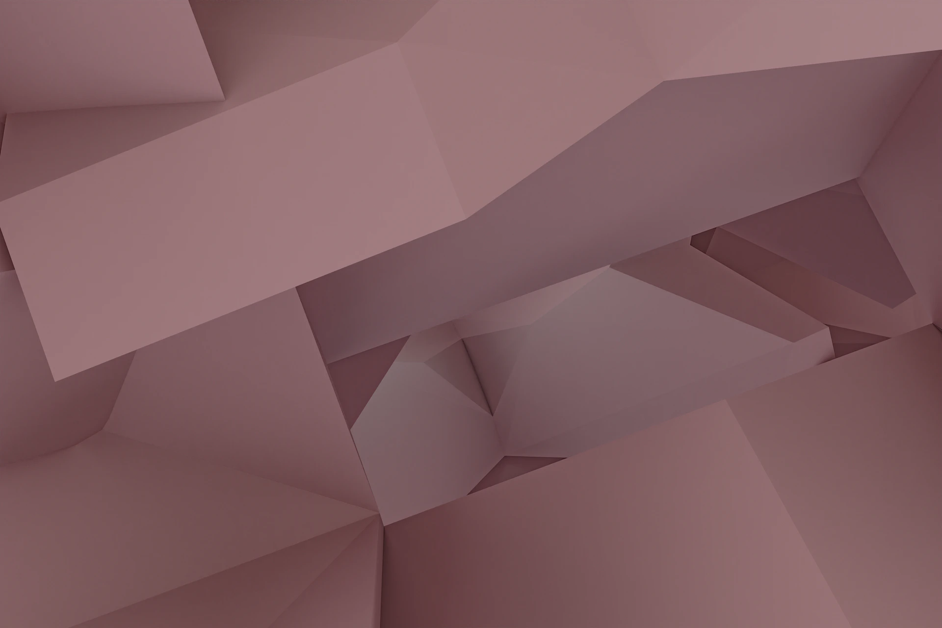 A close up of a pink wall with a clock on it