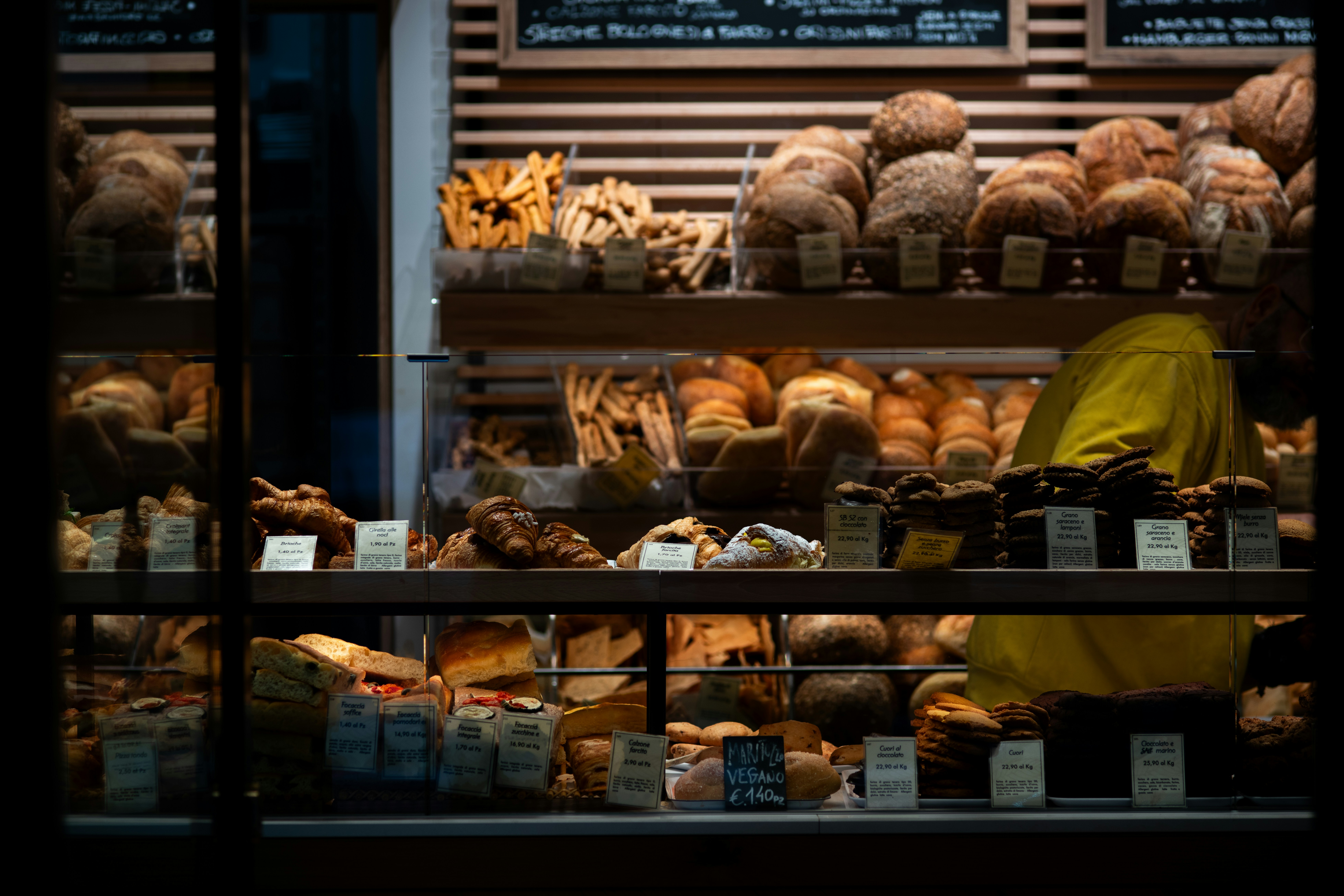 A bakery filled with lots of different types of bread
