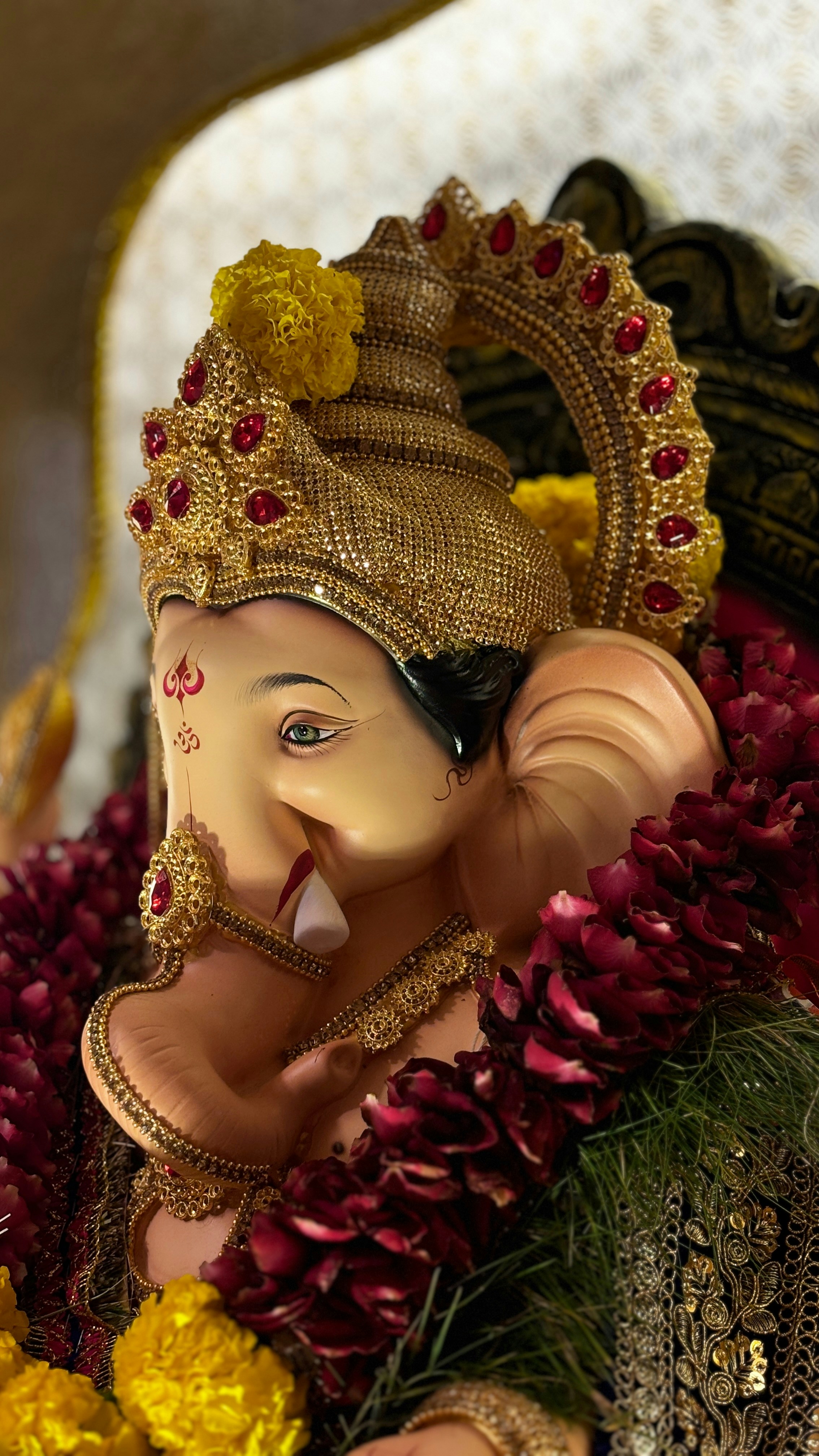 A statue of an elephant wearing a headdress