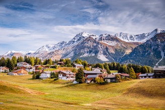 A scenic view of a small town in the mountains