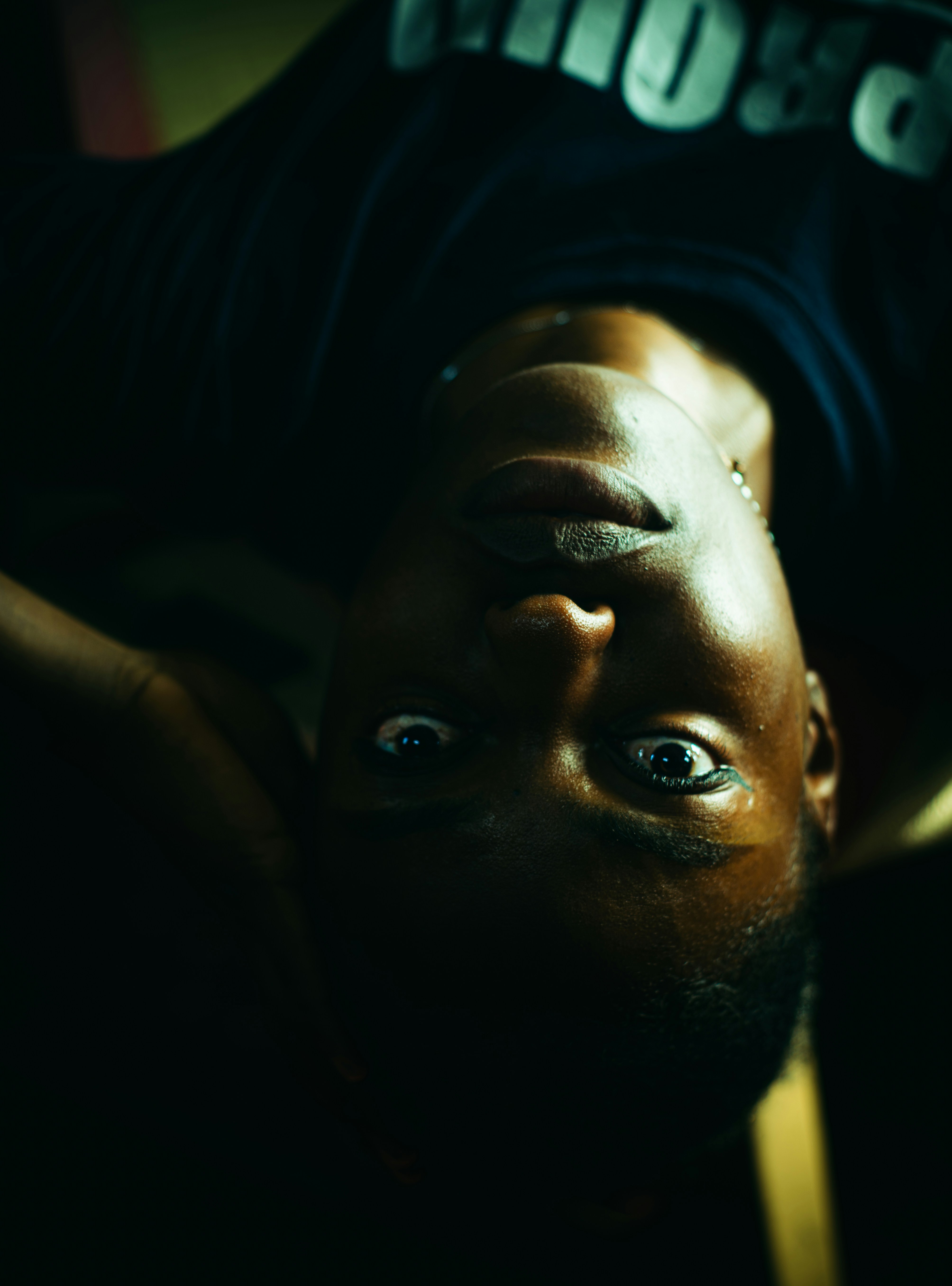 A man laying down with his eyes wide open