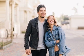 A man and a woman standing next to each other