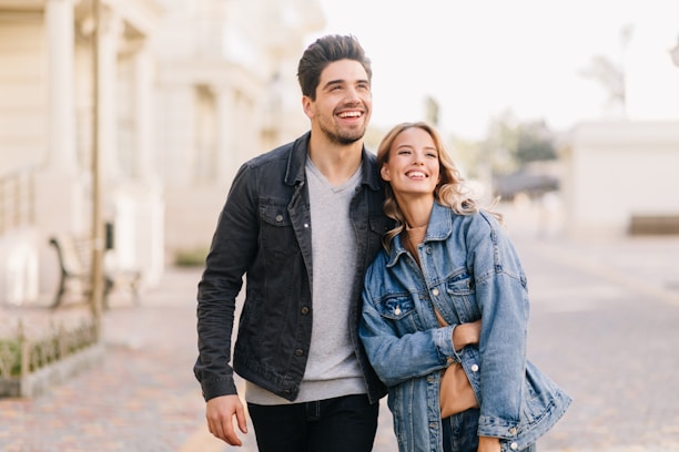A man and a woman standing next to each other
