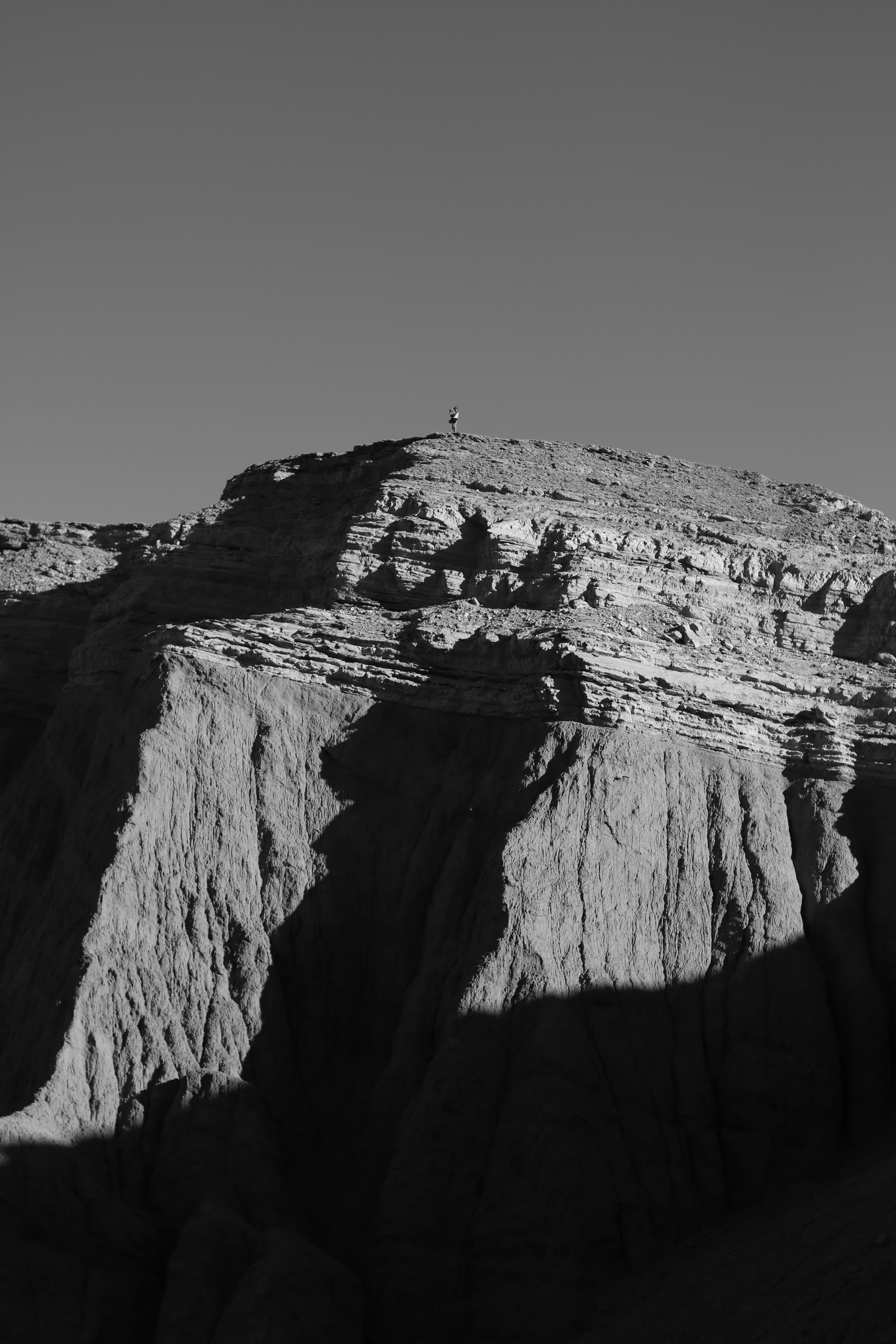 A black and white photo of a mountain