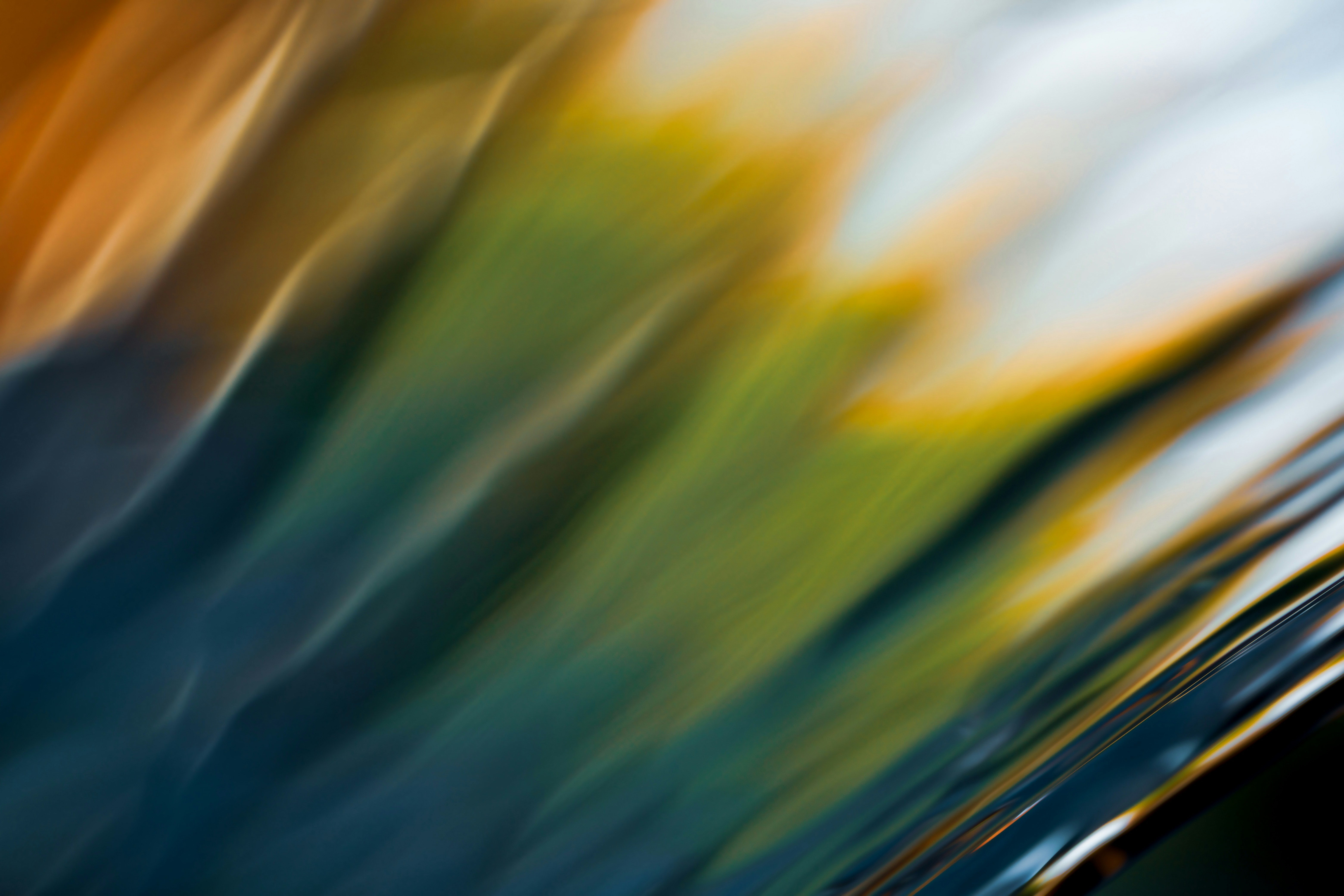 A blurry photo of a person holding a cell phone photo Free