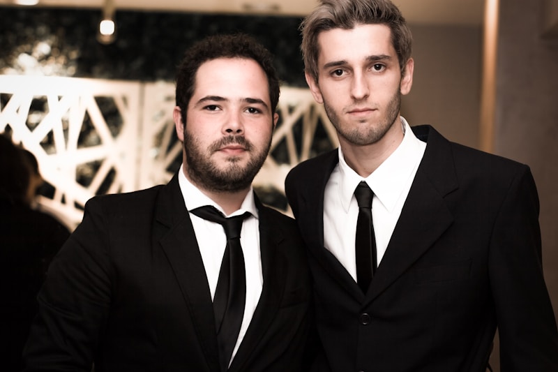 Sophisticated men posing together