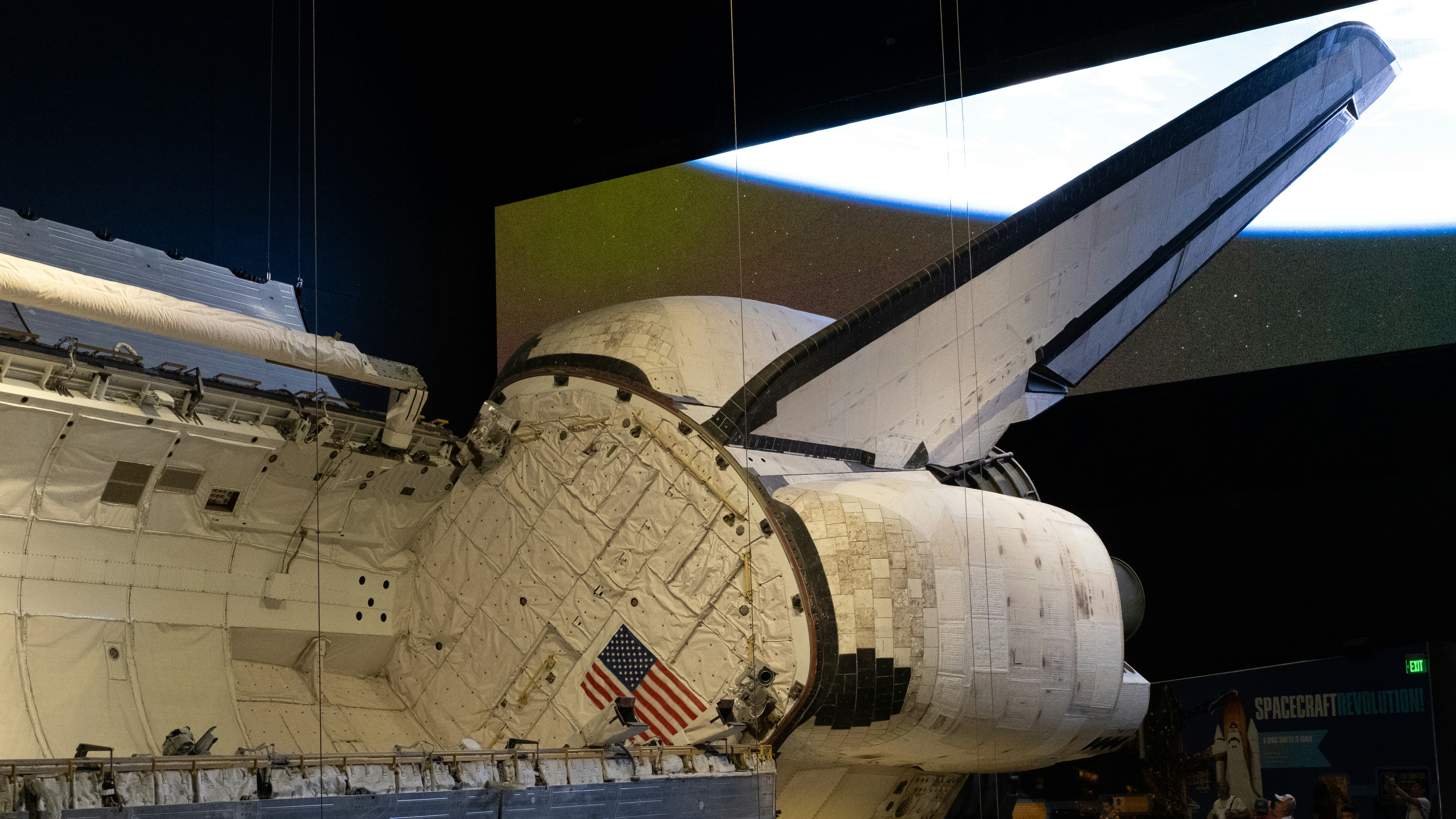 The space shuttle is being displayed in a museum